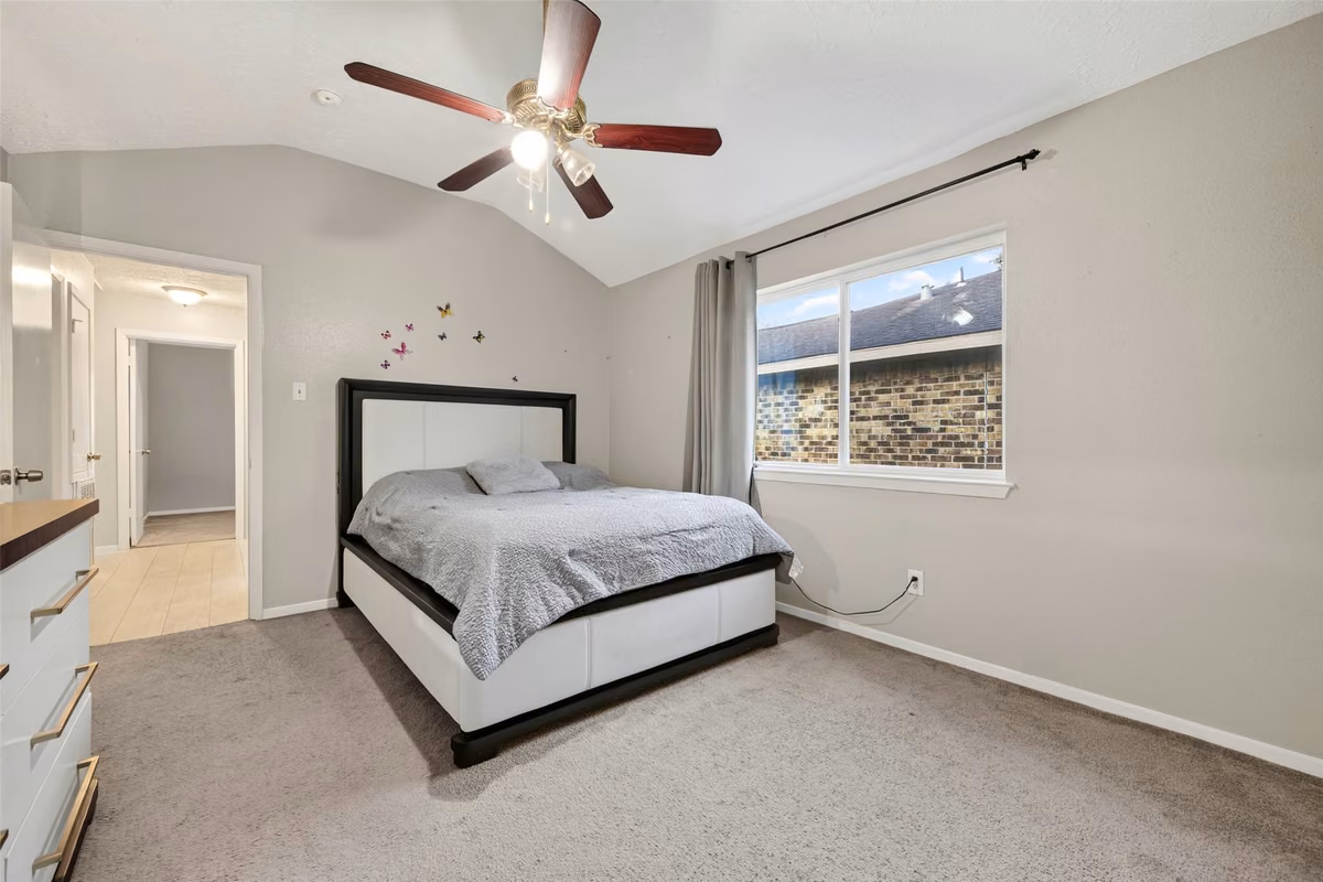 Another view of the primary bedroom