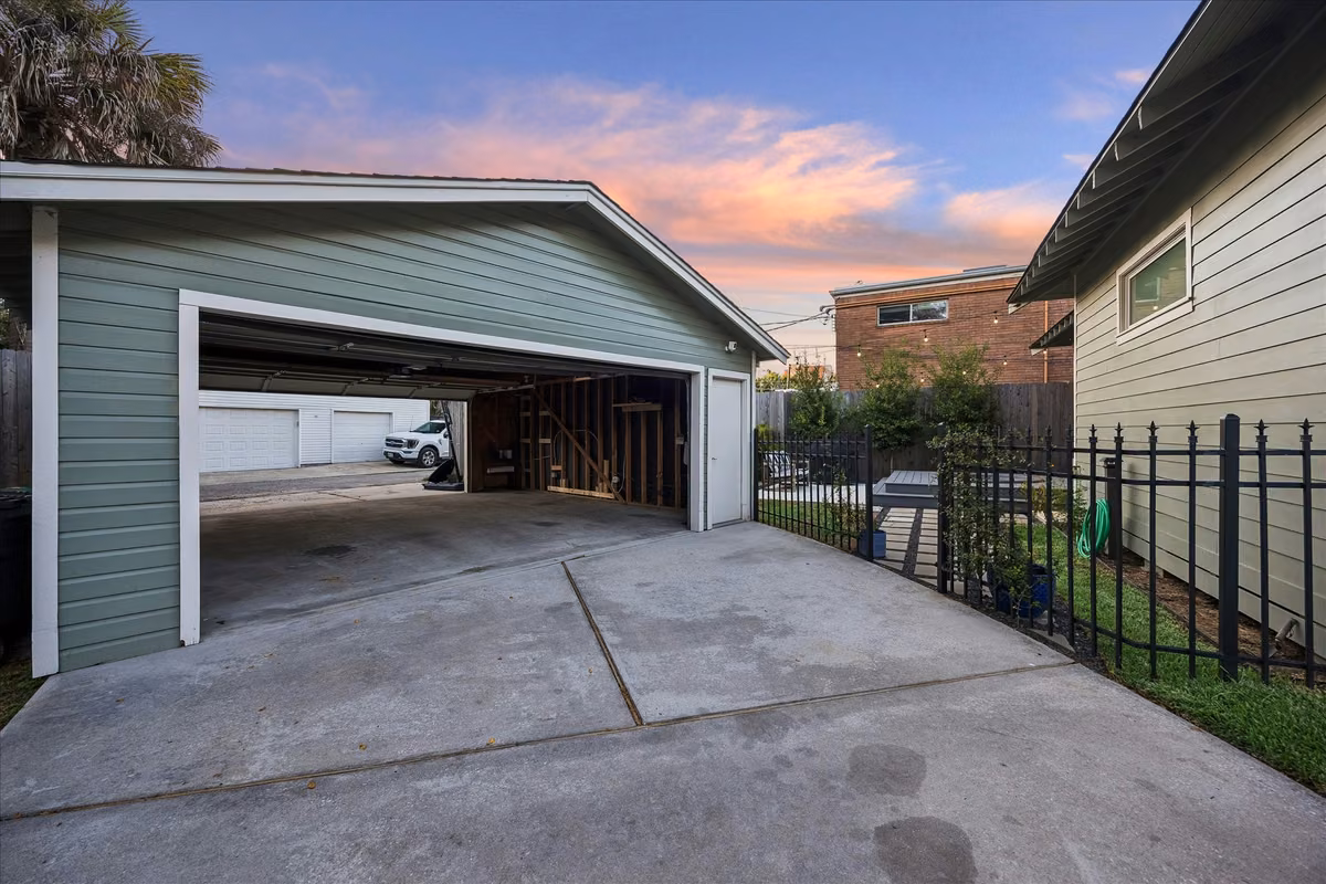 The two car garage can be accessed from both the driveway and the alley behind, making it incredibly easy to pull through and not have to shuffle cars!