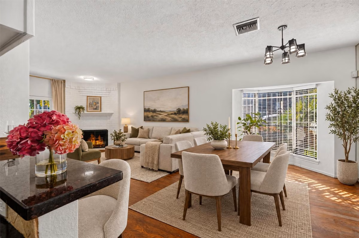 Dining area conveniently positioned beside the kitchen and open to the living room. Virtually staged.