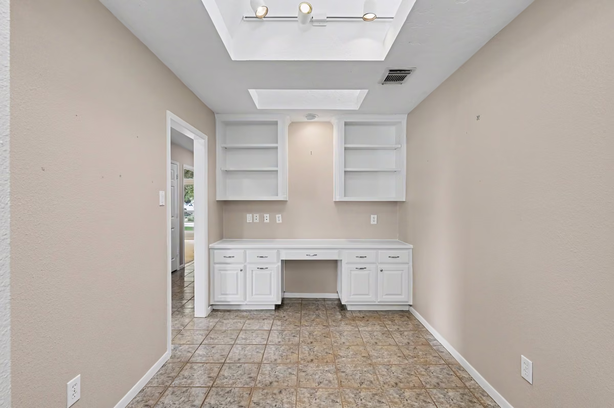 Beautiful built-in Home Office with sky lights for natural light.