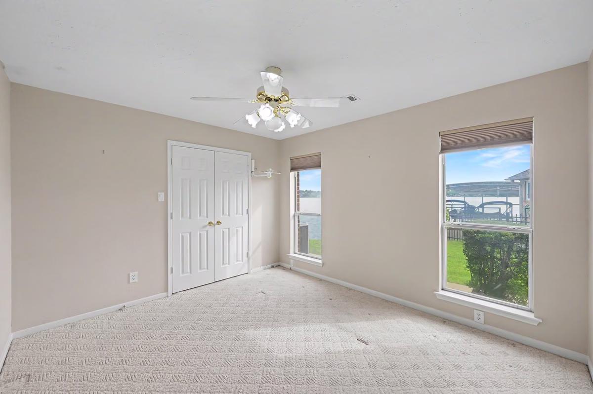 Second Guest Bedroom with water views and generous closet.