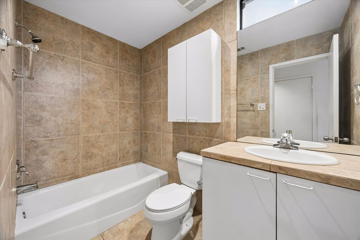 ONE OF THE 2 BATHS IN THE OFFICE AREA. COMPLETE WITH NICE SHOWER, STORAGE, AND ELECTRICAL OUTLETS FOR PERSONAL USE.