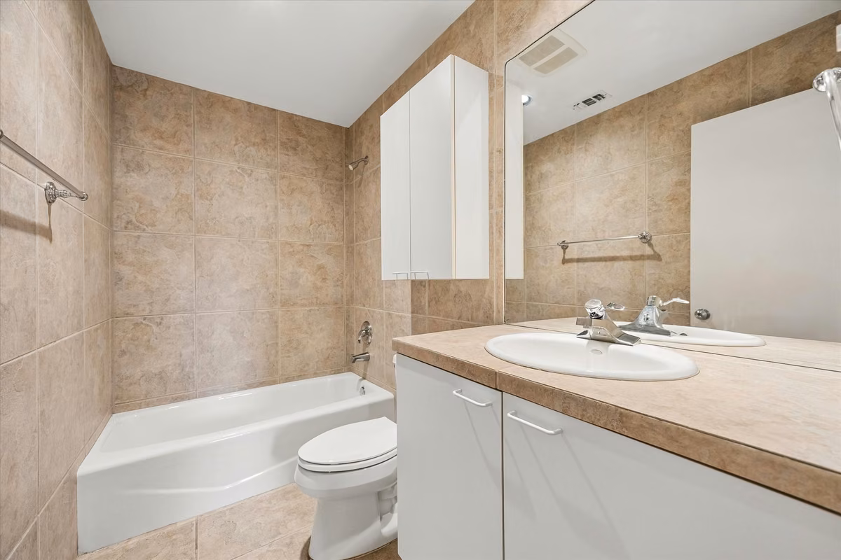 THE OTHER COMPLETE BATH WITH THE SAME STORAGE AND ALL FIXTURES INCLUDED AND ALSO ELECTRICAL OUTLETS FOR PERSONAL ITEMS.