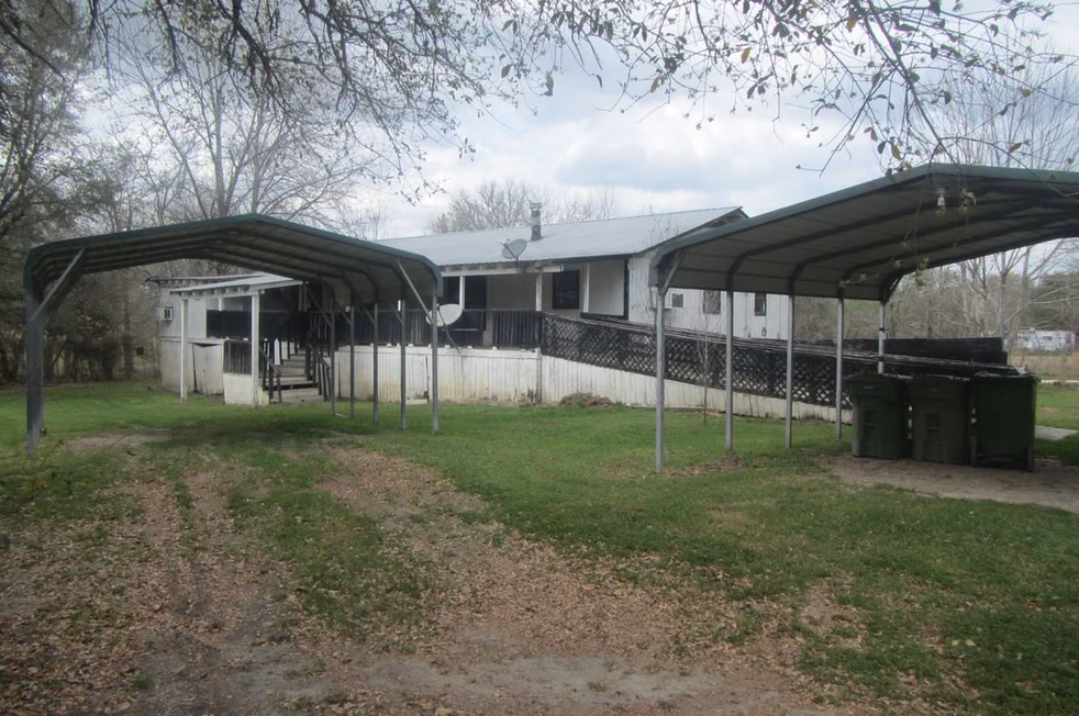 Photo of 11 Harmon Creek Drive, Huntsville, TX 77320