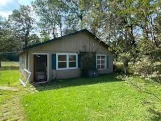 Photo of 6 Post Oak, Huntsville, TX 77320