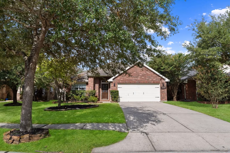 Photo 2 of 30911 Still Oaks Lane, Spring, TX