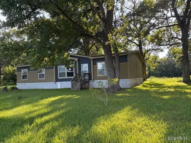 Photo 2 of 409 Fm 2830 Road N, Liberty, TX