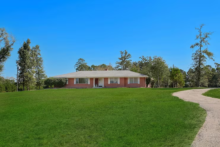 Photo of 7185 State Highway 75 S, Huntsville, TX 77340