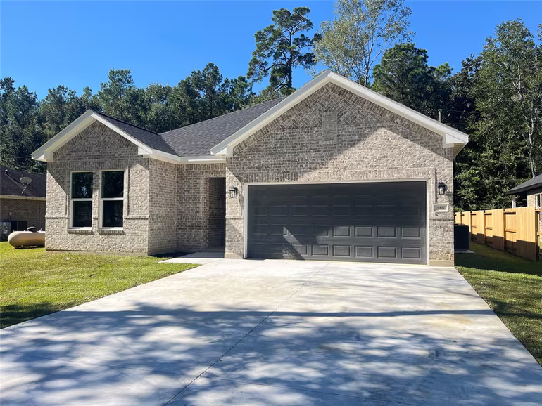 Photo of 28807 Champion Oaks Dr, Magnolia, TX 77354