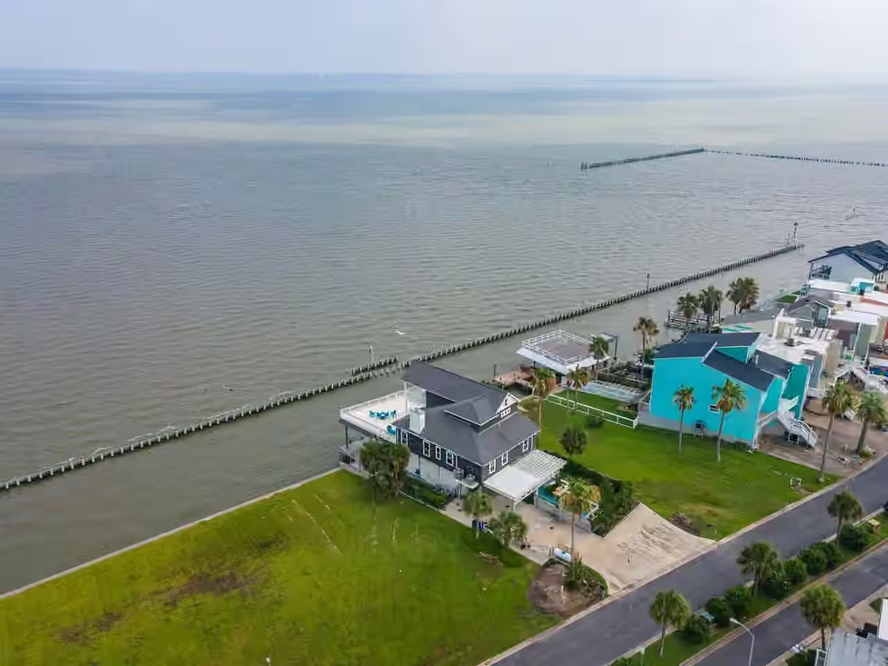 Photo 2 of 12 Tiki Circle, Tiki Island, TX