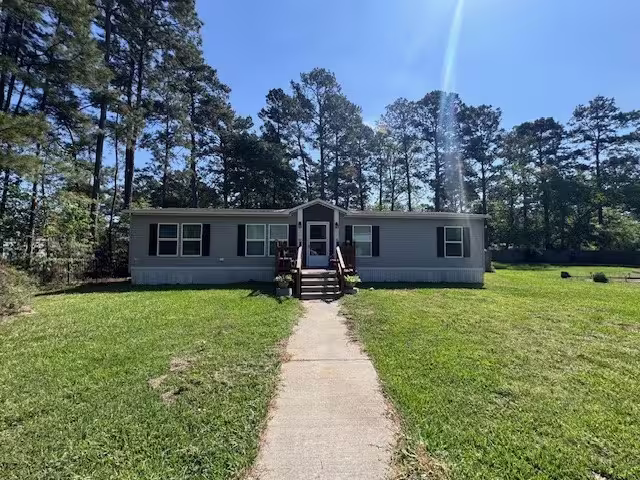 Photo of 320 County Road 2282, Cleveland, TX 77327