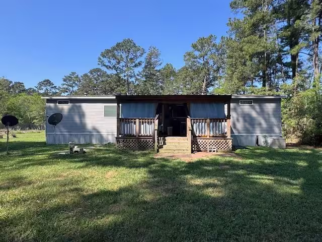 Photo 2 of 320 County Road 2282, Cleveland, TX